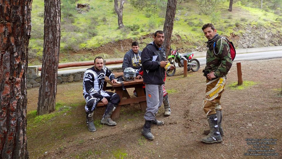 Young bikers are taking a rest after their race in the picnic area of Asinou